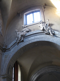 Statue of Clara (left) at Santa Maria del Popolo