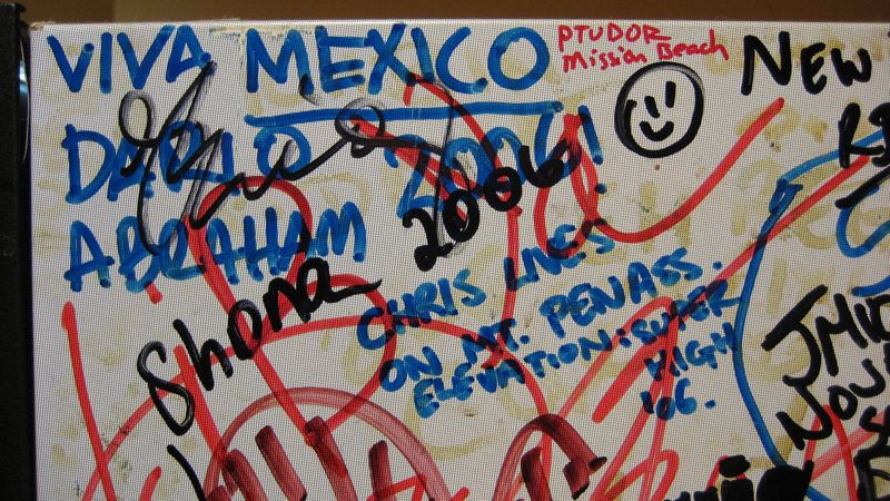 Graffitti on the fridge at Wombat's Lounge in Vienna
