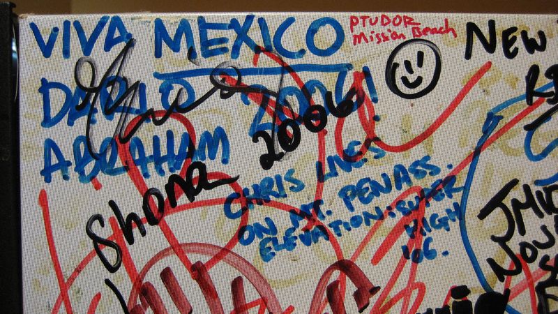Graffitti on the fridge at Wombat's Lounge in Vienna